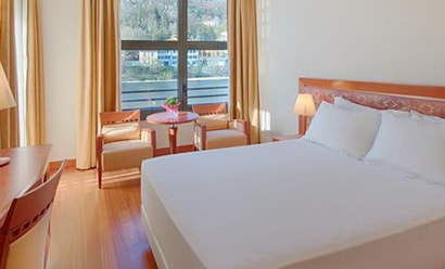 Des Chambres au Confort Optimal à l'hôtel Hotel NH Lecco Pontevecchio 4*